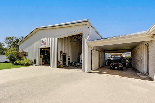 garage with a carport