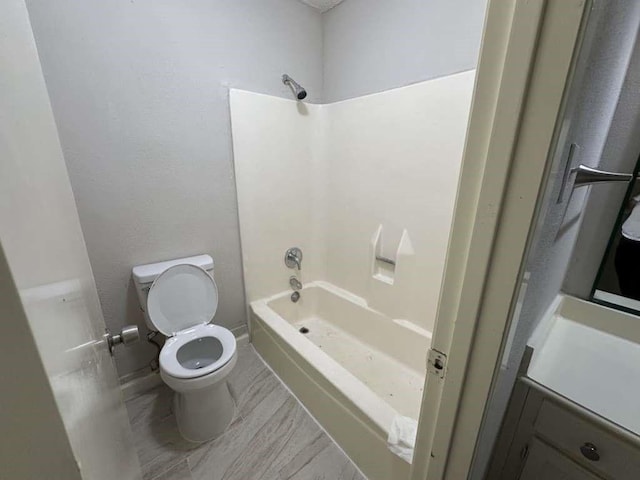 11807 S Youngwood Ln, Houston, TX 77043 - bathroom featuring toilet and tub / shower combination