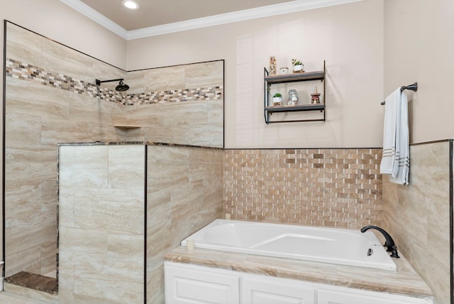 bathroom with tile walls, shower with separate bathtub, and ornamental molding