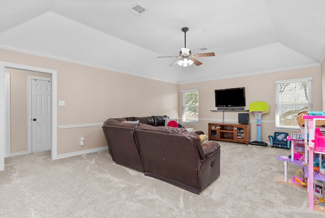 living room with ceiling fan, light colored carpet, and crown molding