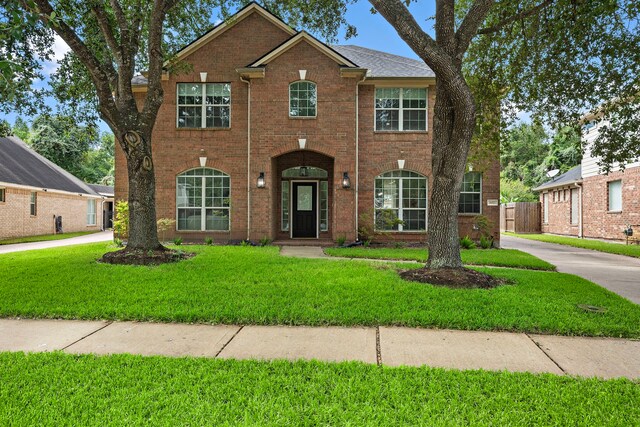 view of front of home with a front yard