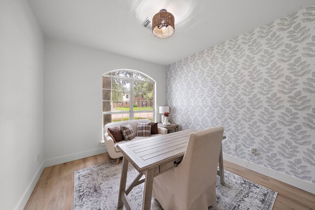 office area with light hardwood / wood-style flooring