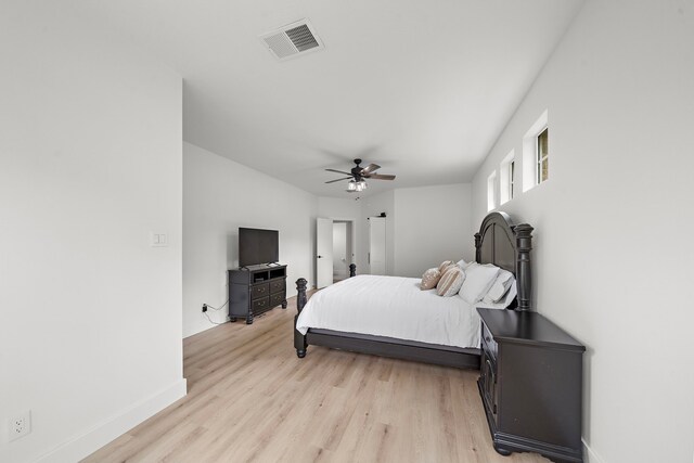 bedroom featuring ceiling fan and light hardwood / wood-style floors