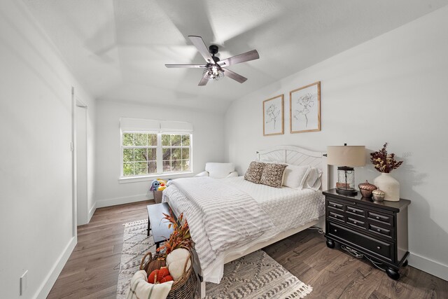 bedroom with wood-type flooring and ceiling fan