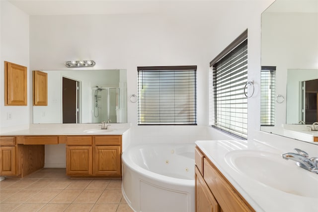 bathroom with tile patterned flooring, vanity, and plus walk in shower