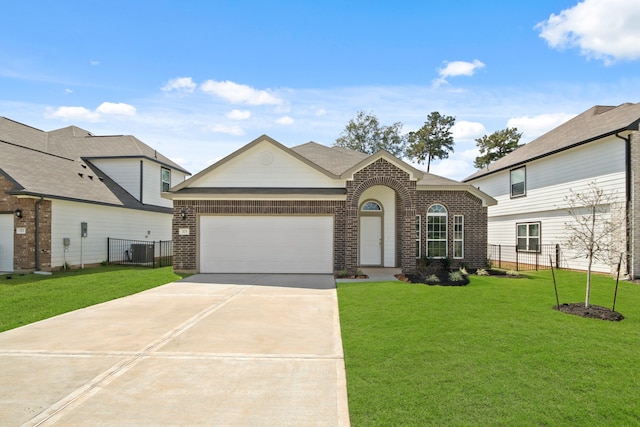 view of front of property with a garage, a front lawn, and central air condition unit