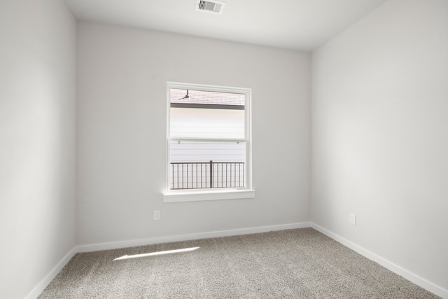 view of carpeted spare room