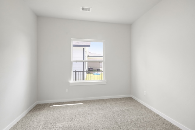 view of carpeted spare room