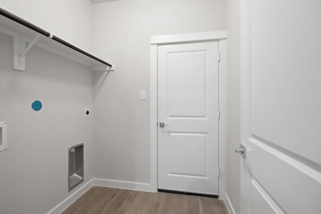 laundry area featuring washer hookup, hardwood / wood-style floors, and electric dryer hookup