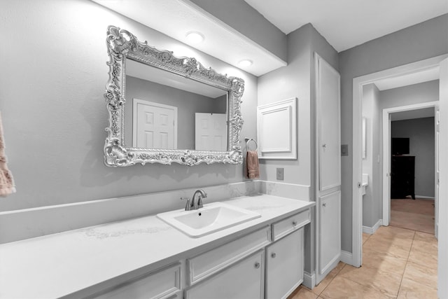 bathroom with vanity and tile patterned floors