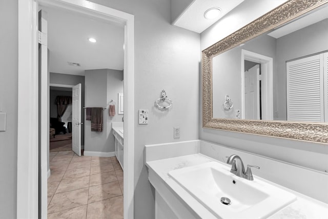 bathroom featuring vanity and tile patterned floors