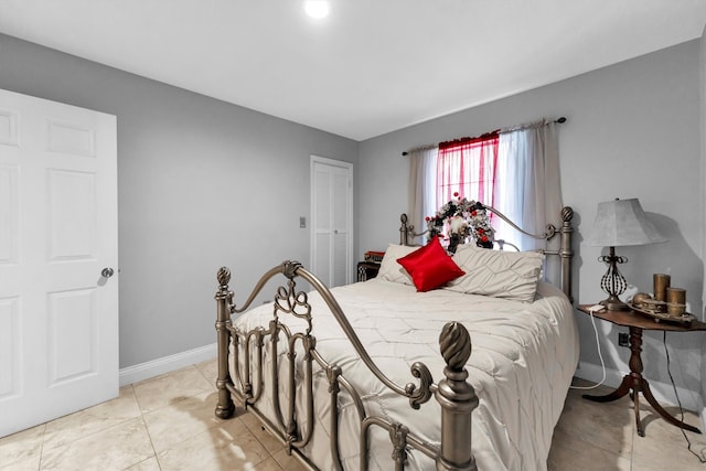 bedroom with light tile patterned flooring