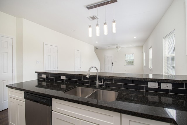 5005 Mallow St A/B, Unit A/B Houston, TX 77033 - kitchen with dishwasher, a sink, white cabinets, a ceiling fan, and recessed lighting