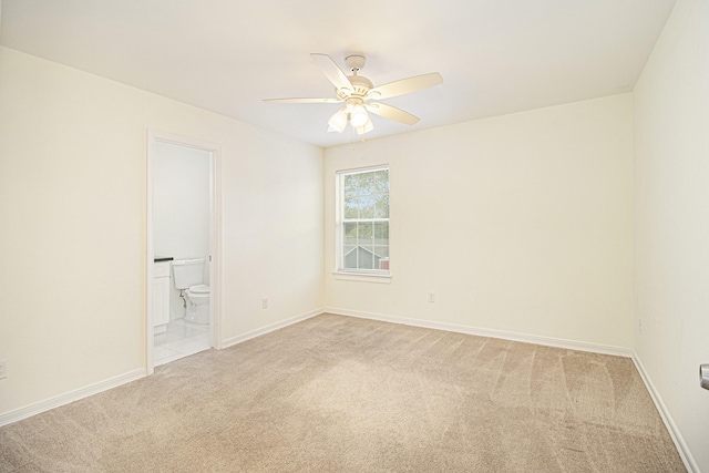 5005 Mallow St A/B, Unit A/B Houston, TX 77033 - unfurnished bedroom featuring light colored carpet, baseboards, and connected bathroom