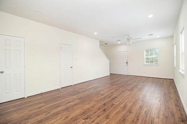 unfurnished room with ceiling fan and dark hardwood / wood-style floors