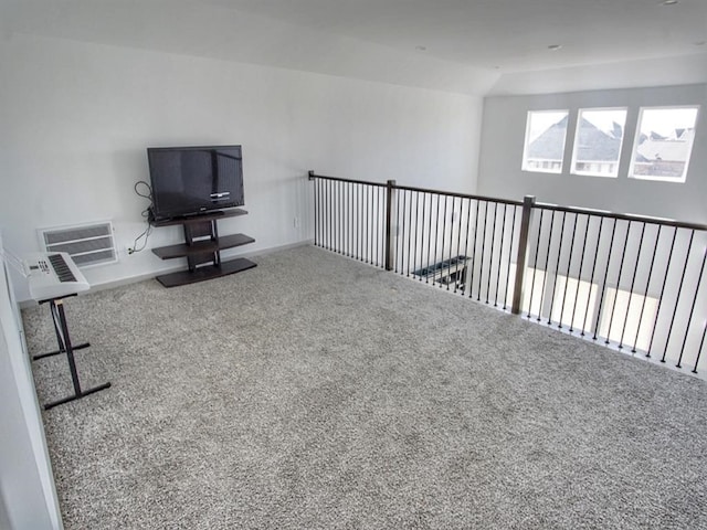 interior space with lofted ceiling and carpet flooring