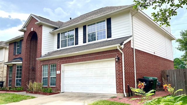 view of front of home with a garage