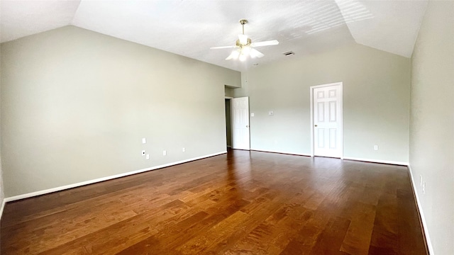 spare room with lofted ceiling, ceiling fan, and dark hardwood / wood-style flooring