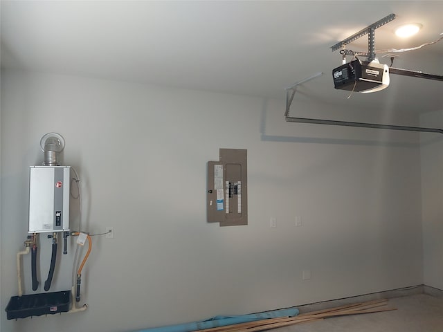 interior space with a garage door opener and electric panel