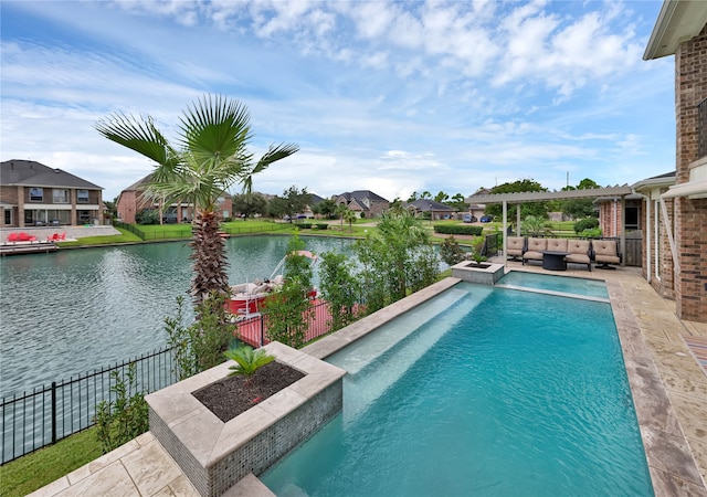 view of swimming pool featuring outdoor lounge area, a water view, and a patio