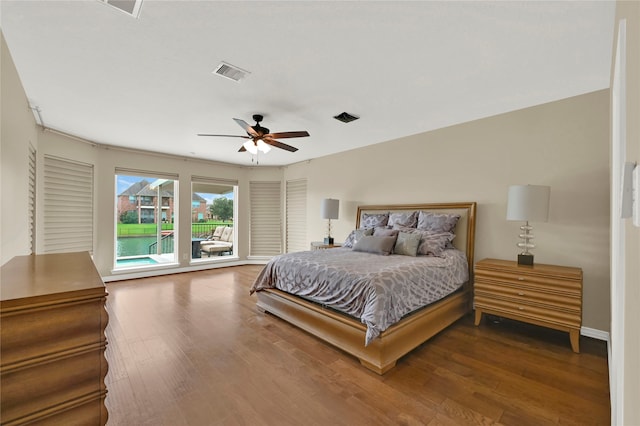 bedroom with ceiling fan, wood-type flooring, and access to outside