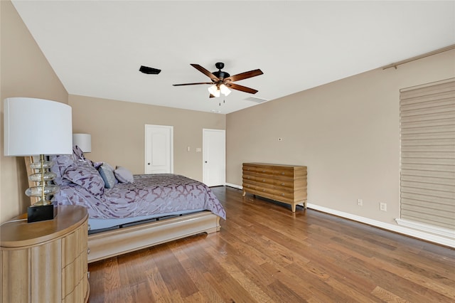 bedroom featuring hardwood / wood-style flooring and ceiling fan