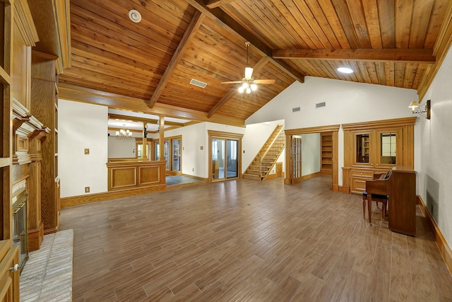 living room with high vaulted ceiling, a brick fireplace, hardwood / wood-style flooring, beam ceiling, and wood ceiling