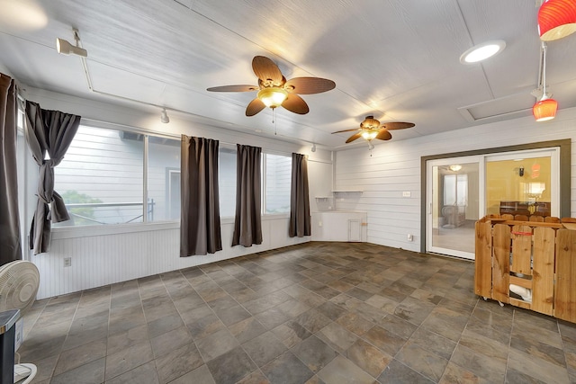 unfurnished room featuring ceiling fan