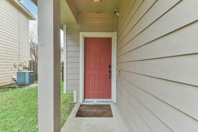 view of exterior entry featuring cooling unit