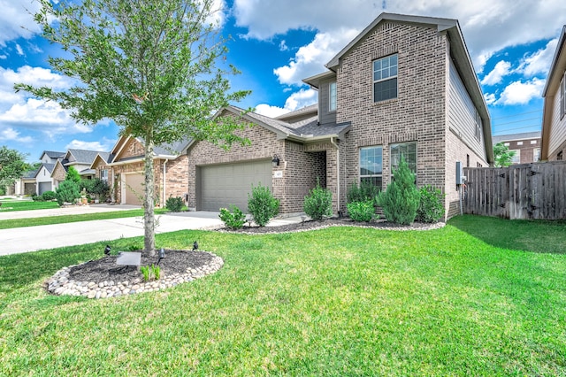 view of front facade featuring a garage and a front yard