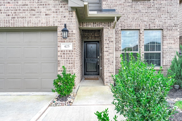 property entrance featuring a garage