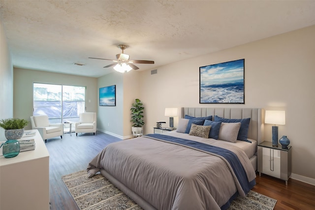 bedroom featuring wood-type flooring and ceiling fan