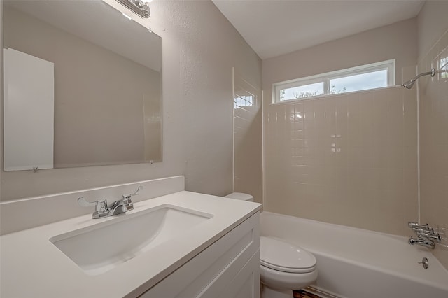 full bathroom featuring vanity, toilet, and shower / tub combination