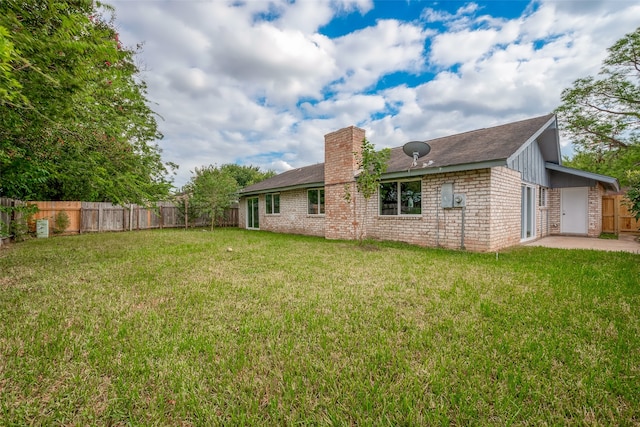 exterior space featuring a yard and a patio