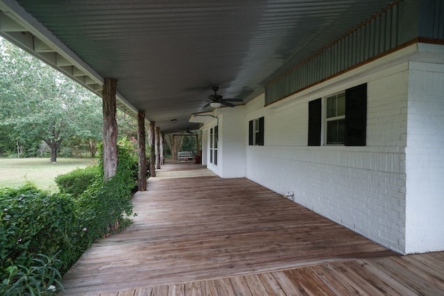 wooden terrace with ceiling fan