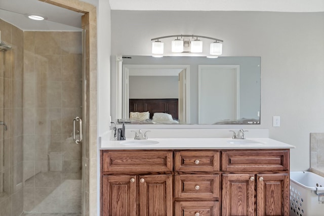 bathroom featuring vanity and shower with separate bathtub