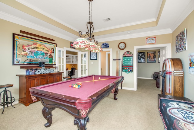 playroom featuring pool table, a raised ceiling, light colored carpet, french doors, and ornamental molding