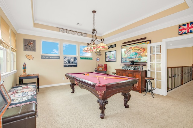 rec room with light colored carpet, crown molding, billiards, and a raised ceiling