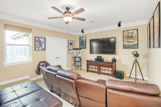 living room featuring light carpet, ceiling fan, and crown molding