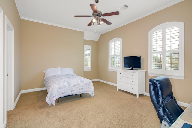 bedroom featuring ceiling fan, crown molding, and light colored carpet