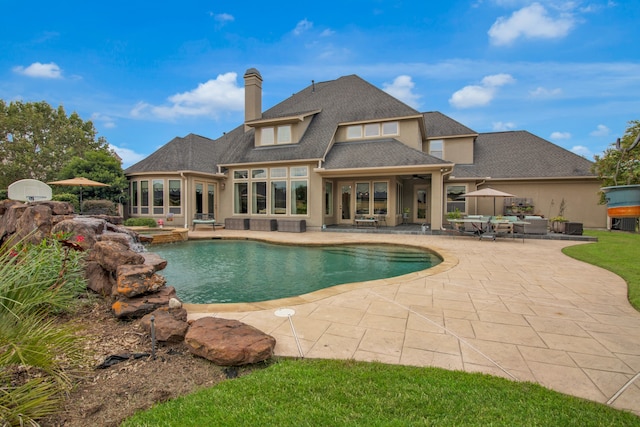 view of swimming pool with a patio area