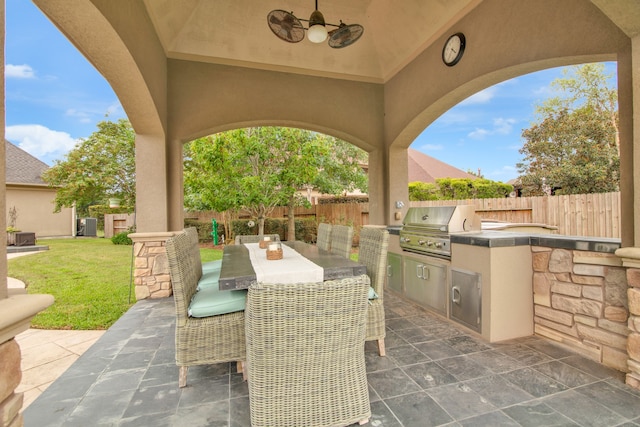 view of patio / terrace with ceiling fan, cooling unit, grilling area, and area for grilling