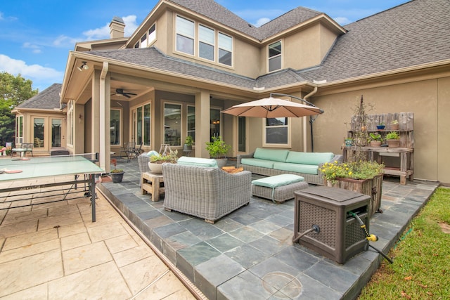 view of patio featuring an outdoor hangout area and ceiling fan