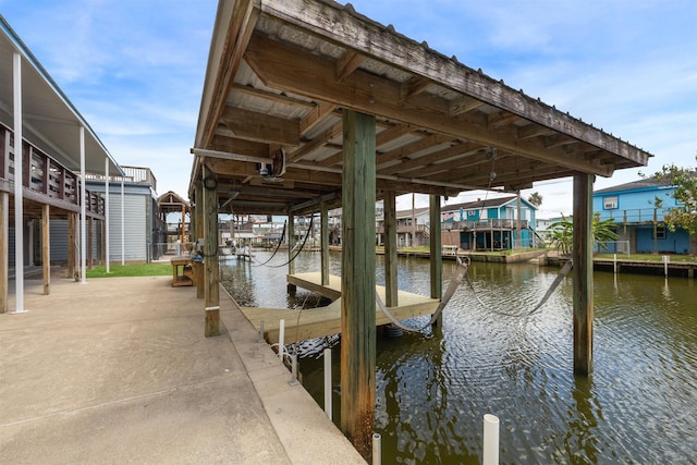 dock area featuring a water view