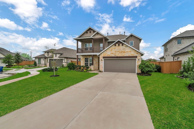 craftsman-style house with a front yard, a balcony, and a garage