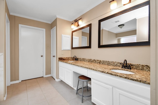 bathroom with ornamental molding, vanity, and tile patterned floors