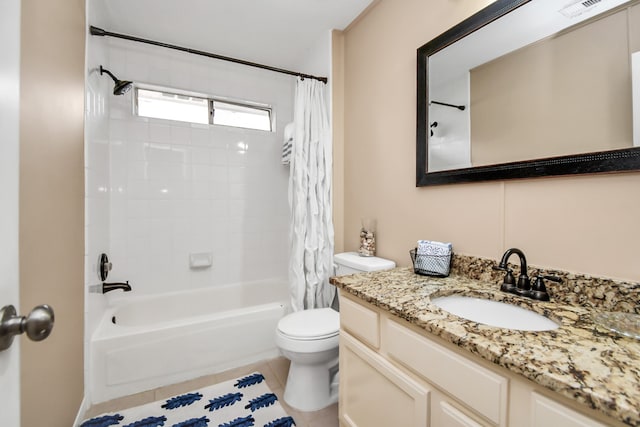 full bathroom with shower / bath combination with curtain, vanity, tile patterned flooring, and toilet