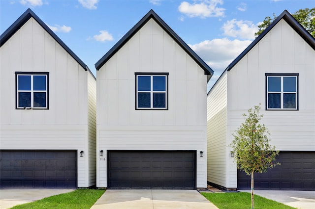 modern farmhouse style home with a garage