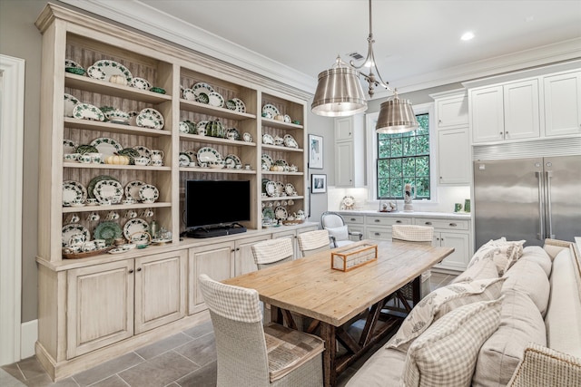 tiled dining space with crown molding