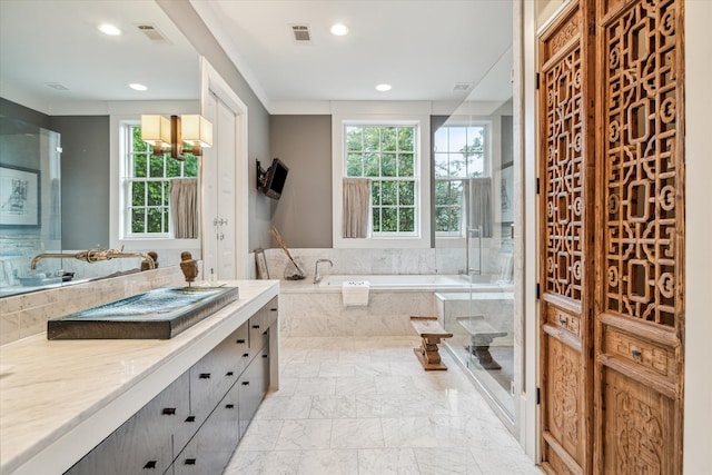 bathroom with separate shower and tub and vanity